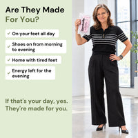 Are They Made For You? A woman in her fifties stands in a bright office in black heels, one hand on her hip, holding a Bambelle sock pouch. Checklist: on your feet all day, shoes on from morning to evening, home with tired feet, energy left for the evening. If that's your day, yes. They're made for you.
