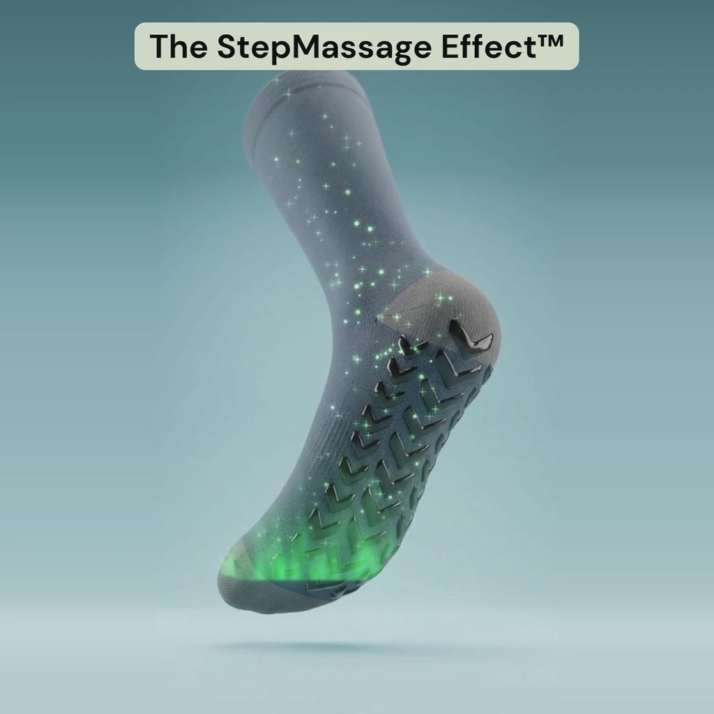 A Bambelle StepMassage Arch Sock turns in 3D while green light and sparkles rise from The StepGrip Sole up the calf, with callouts: The StepGrip Sole, chevron-shaped grips turn every step into a massage, massages your arch with every step, helps ease tired, achy legs, works inside every shoe